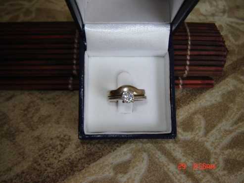 0.6 carat diamond ring set in 18 carat white gold