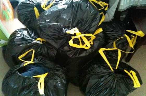 10 black bags full of ladies second hand and new clothes