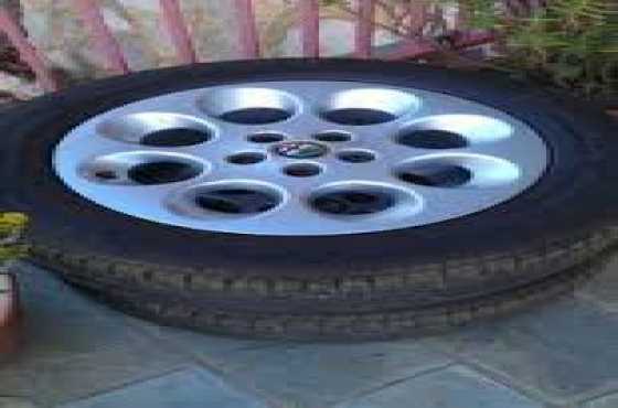 15 inch Alfa Romeo original set of  mags and tyres for sale  Contact 0764278509 whatsapp 0764278509