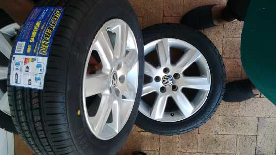 15 vw polo original rims 4x100 with brand new tyres 1856515 set r5999