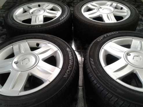 15inch    mag rims   with  tyres   for  sale  or  swop