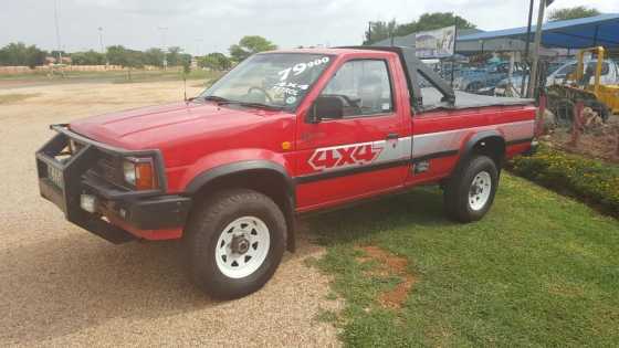 1991 Red Nissan 2.4 4x4 Petrol lwb SCab