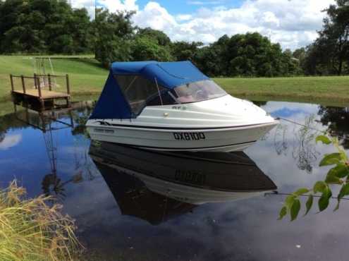 1998 SF Haines Hunter on a Boeing trailer powered  by a 1997 90 HP two stroke outboard .