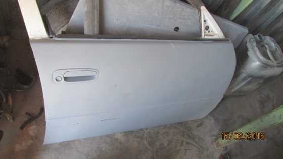 1999 Toyota Corolla right front door shell