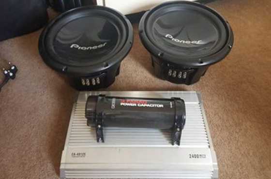 1x 2400 watts 4 channel amp 1x 3 farad power capacitor 2x pioneer subs dvc