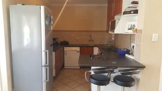 2 Bedroom , 1 bathroom , 1 carport for sale in Midrand 24 hour security complex ,