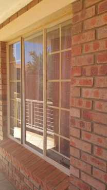 2 bedroom first floor flat in a security estate in Orchards Pretoria North