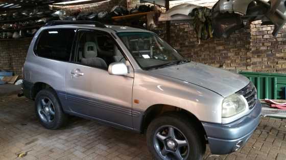 2 door silver suzuki automatic