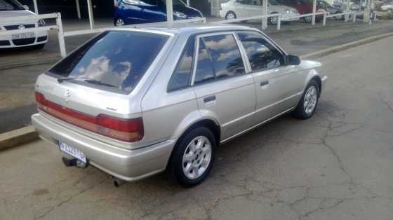 2001 Mazda 323 1.6i (fuel-ingestion with aircon) mileage-156000km