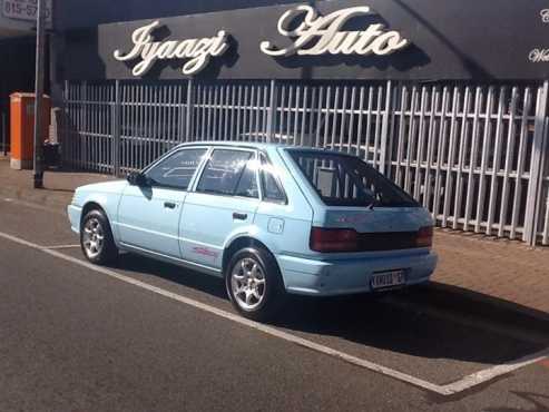 2003 MAZDA STING 323