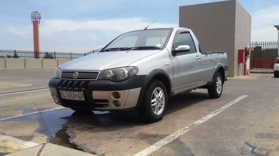 2005 Fiat Strada Single Cab.Great condition needs only new front tires. Brand new PreMat Cover. Towb