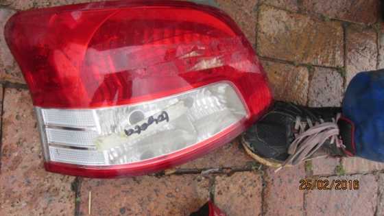 2008 Toyota Yaris sedan left taillight