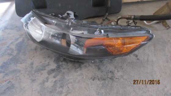 2009 Honda Accord left headlight