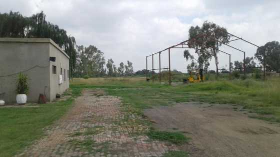 2.4HA Plot with house and borehole for sale