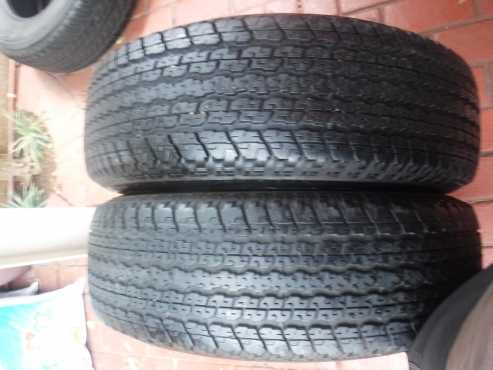 2xBridgestone Dueler HT tyres 2557018,1x as new,1x80 percent tread