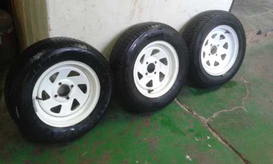 3x 13quot Steel rims with tires plus caravan axle