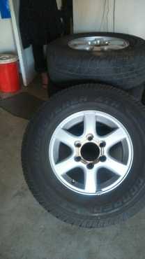 4 rims and tyres Isuzu urgent sale