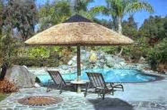 4 x Thatch umbrellas for sale