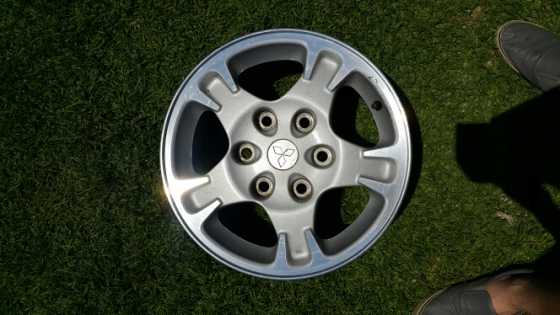 5 pajero rims with 4 tyres everything for R500