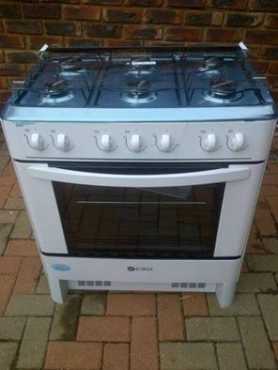 6 burner gas stoveoven like new