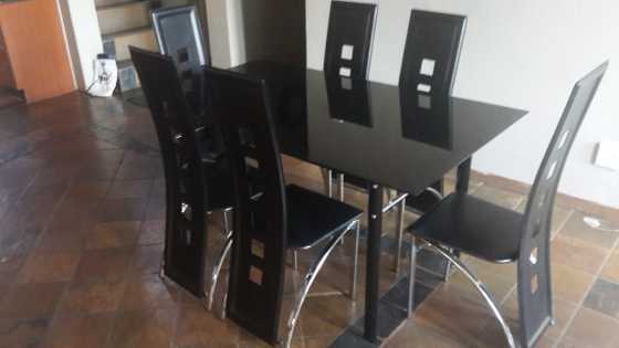 6 Seater Glass Top Dining Room Suite (Like new and not a scratch)