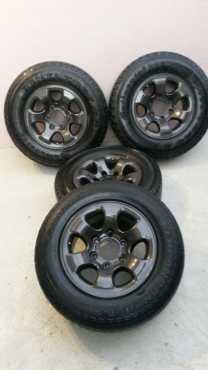 6140 pcd 15 inch gunmetal mags amp tyres for sale R3000 neg