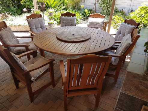 8 Seater Round Patio Dining Table with 8 chairs and cushions