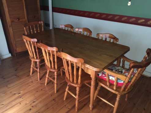 8 seater wooden table and chairs