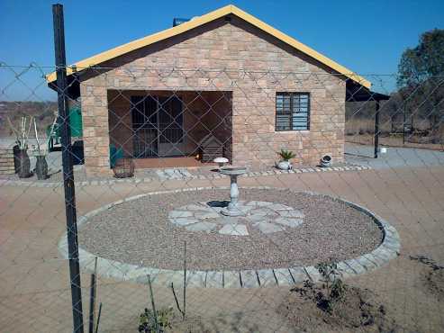 8.5 hec Plot for sale or to swop for 2 bed room house in town