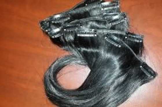 8pc clip in human hair extensions.