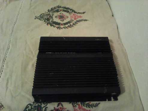 A black alpine car amplifier.