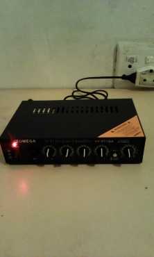 A brand new black omega mini professional amplifier