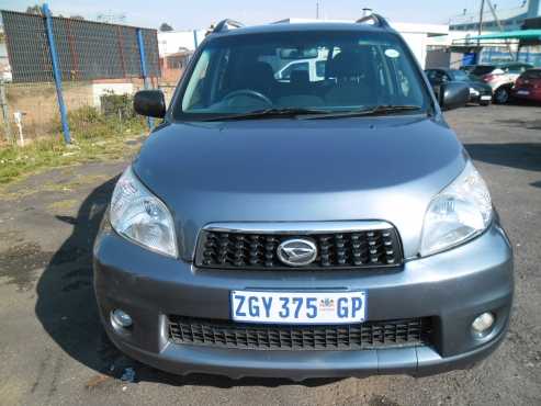 A Daihatsu Teirous , 2010 Model, 108000km, grey in color, 4-doors, factory ac, cd player, central