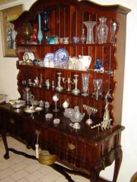 A magnificent display cabinet made of Imbuia.  Ball amp Claw feet.    Beautiful condition.