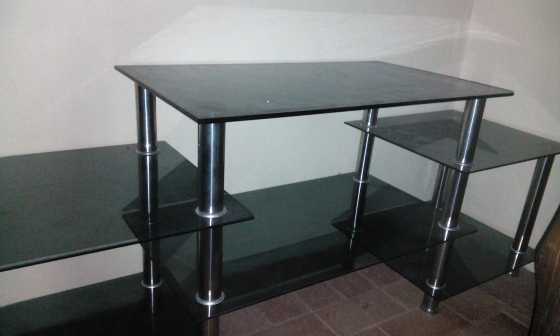 a nice glas tv stand for sale .