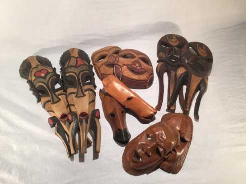 . A selection of African masks which can be used to create an African feel. Will go