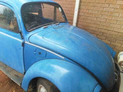 A VW Beetle for sale with papers