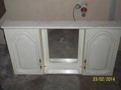 a white cabinet for sale.