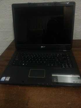 Acer Extensa 5630EZ laptop with charger