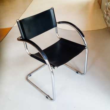 Amazing Bauhaus style chair, sturdy condition, small blemishes on black leather seating