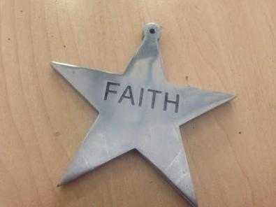 Antique -Silver Star written Faith