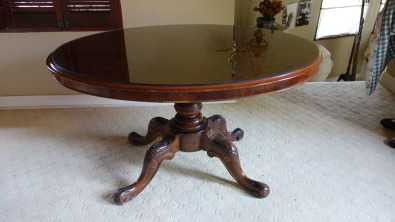 Antique walnut table with glass top