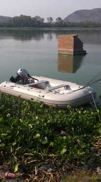 Aquastrike 3.8 m inflatable boat with 18 hp Titan outboard