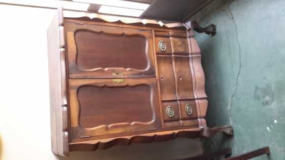 Ball and claw cabinet