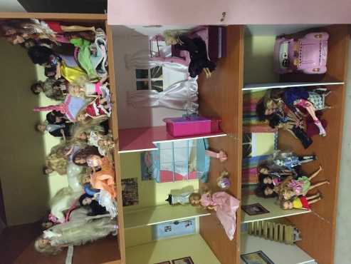 Barbie doll house and dolls