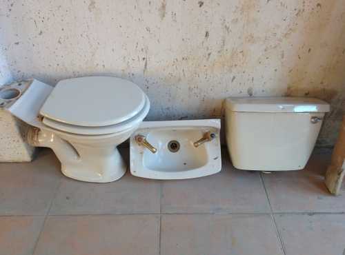 Basin with taps and Toilet