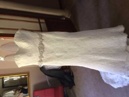 Beautiful Ivory Lace Cosmobella wedding dress for sale