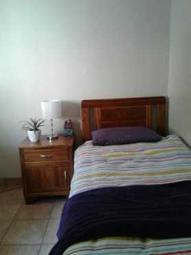 BEDROOM SUITE. SOLID TEAK HEADBOARD (SINGLE) WITH 1 X MATCHING PEDESTAL