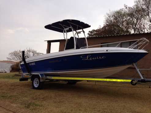 Benguela (19ft5,8m) with 2 x Evinrude E-Tec 90hp motors.