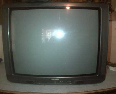 Big colour tube tv with remote.